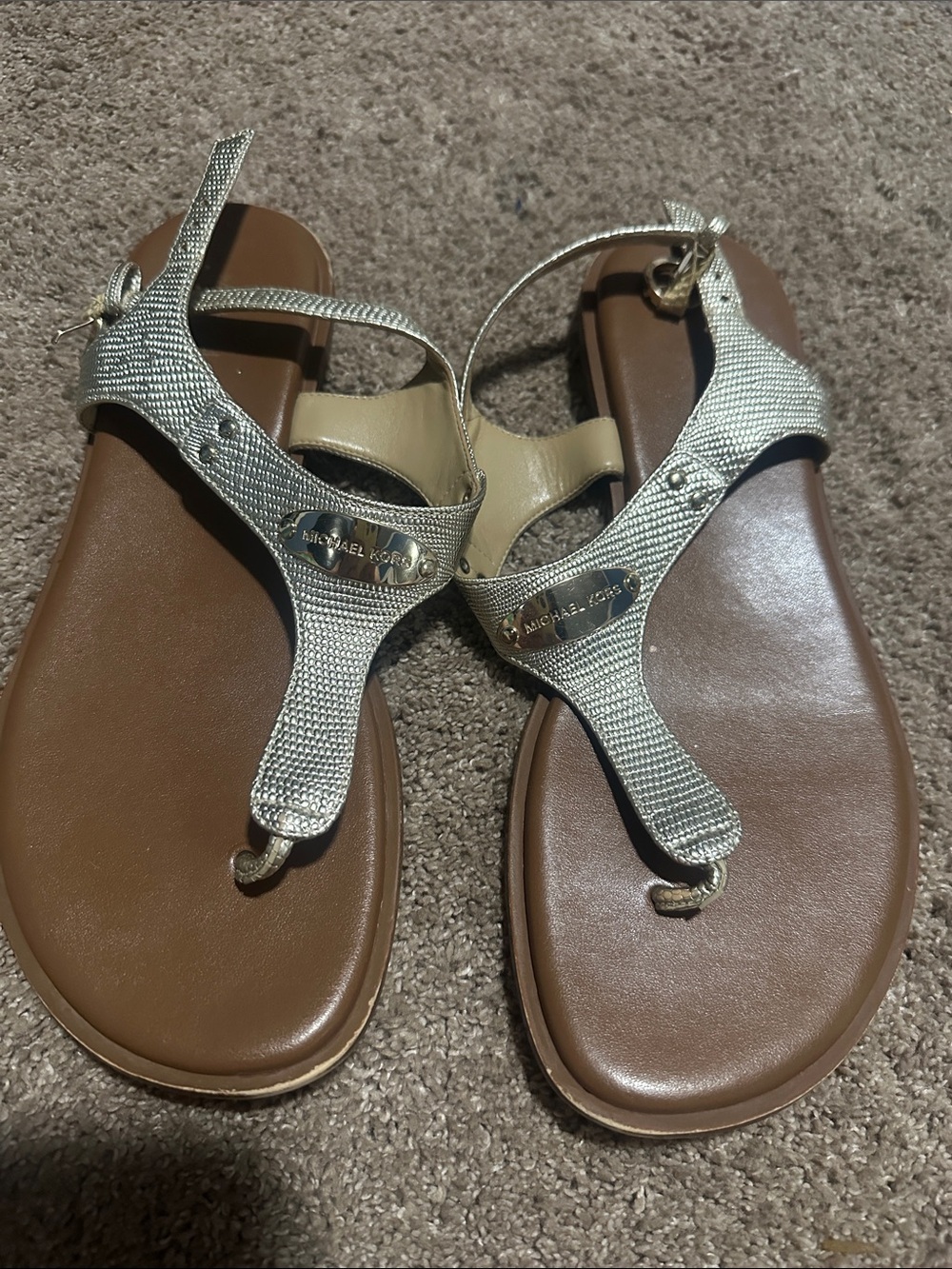 Michael Kors Metallic Silver T-Strap Sandals with Brown Footbed